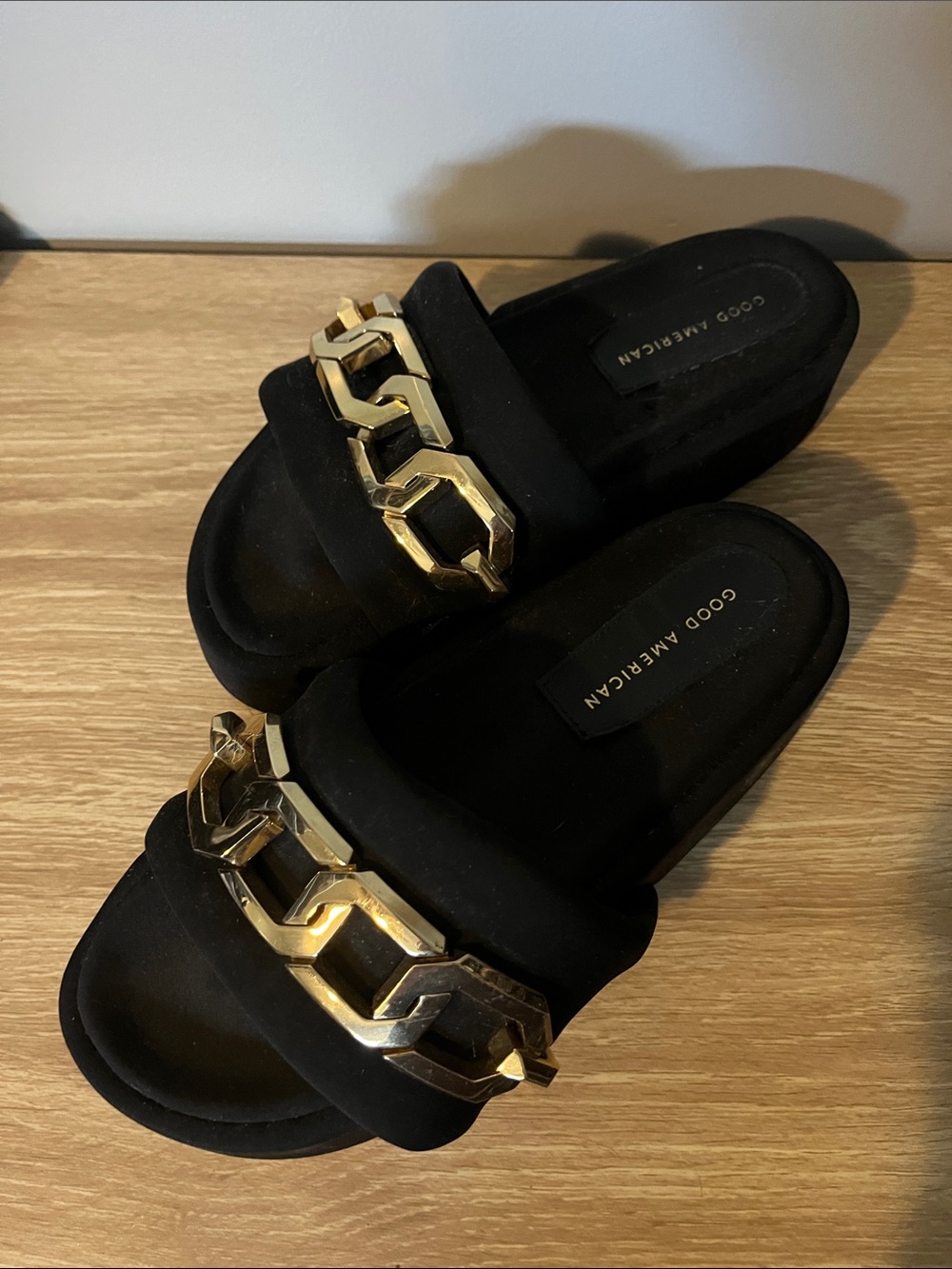 Good American Black Slide Mules with Chunky Gold Chain